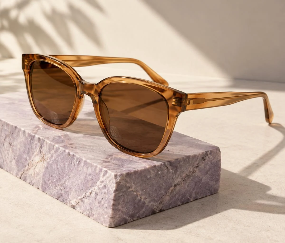 Illustrative amber sunglasses with brown tinted lenses